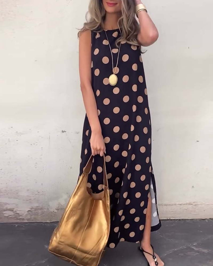 Chrisitine - Elegante vestido de lunares